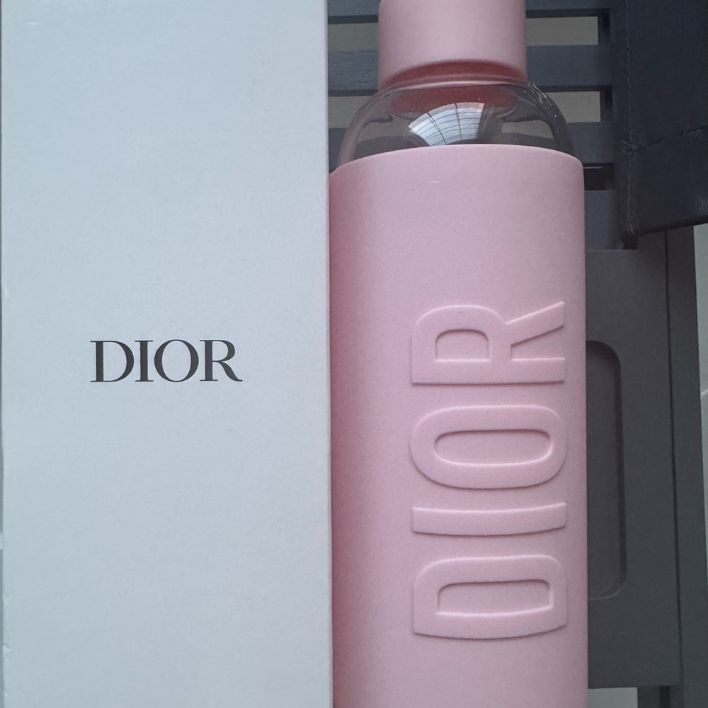 Dior Soft Pink Glass Bottle with Silicone Embossed Logo Covering